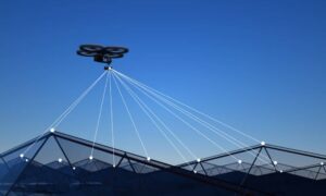 Drone collecting LiDAR mapping data by scanning the ground with laser beams to create accurate site models for modern projects