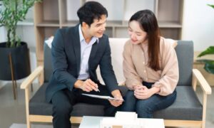 Developers reviewing an ALTA survey during a commercial real estate deal discussion