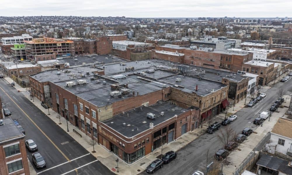Aerial view of adjoining commercial parcels forming a potential redevelopment site supported by an ALTA title survey