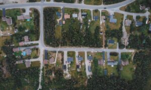 Property survey multiple street frontages - ALTA SURVEY Massachusetts Aerial view of residential lots and intersecting streets, illustrating the layout considered in a property survey