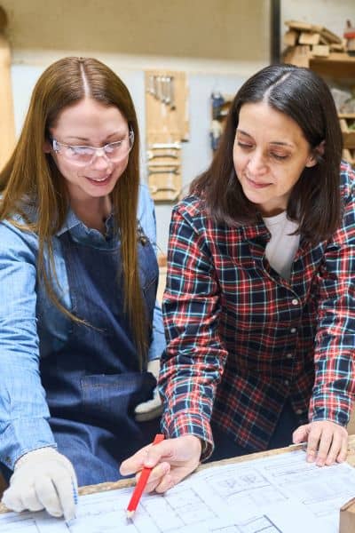 Surveying mentorship apprenticeship training session - ALTA SURVEY Massachusetts Mentor guiding apprentices through land survey plans during ALTA Land Title Survey training session