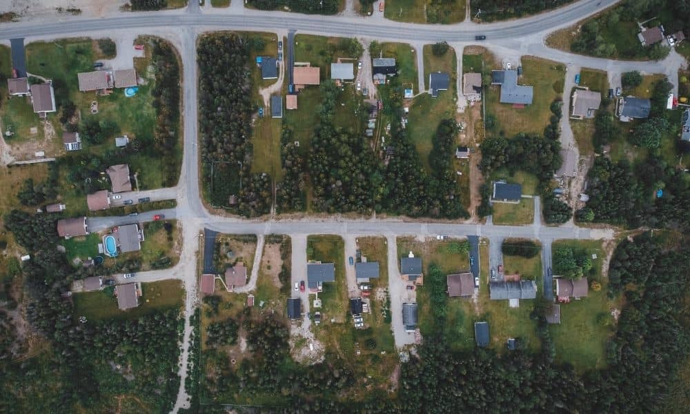 Aerial view of residential lots and intersecting streets, illustrating the layout considered in a property survey